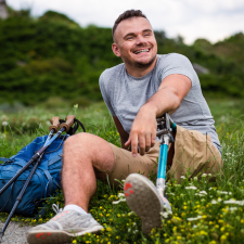 man sitting in a field